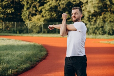 Man emphasizing regular exercise